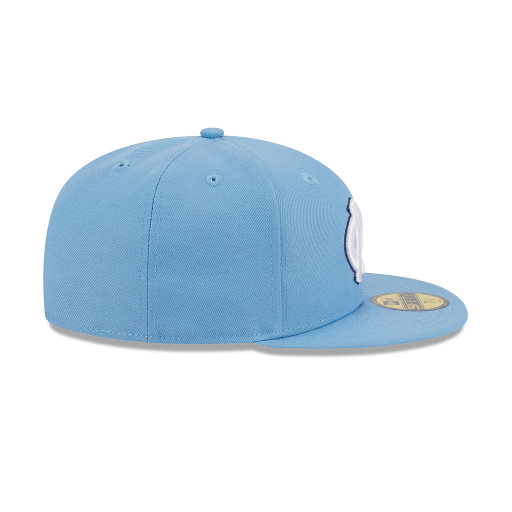 https://cdn.shopify.com/s/files/1/0601/2554/4675/files/60399221_59FIFTY_EVERGREEN_NOCTAR_OTCOTCOTC_RSIDE.jpg?v=1713795165