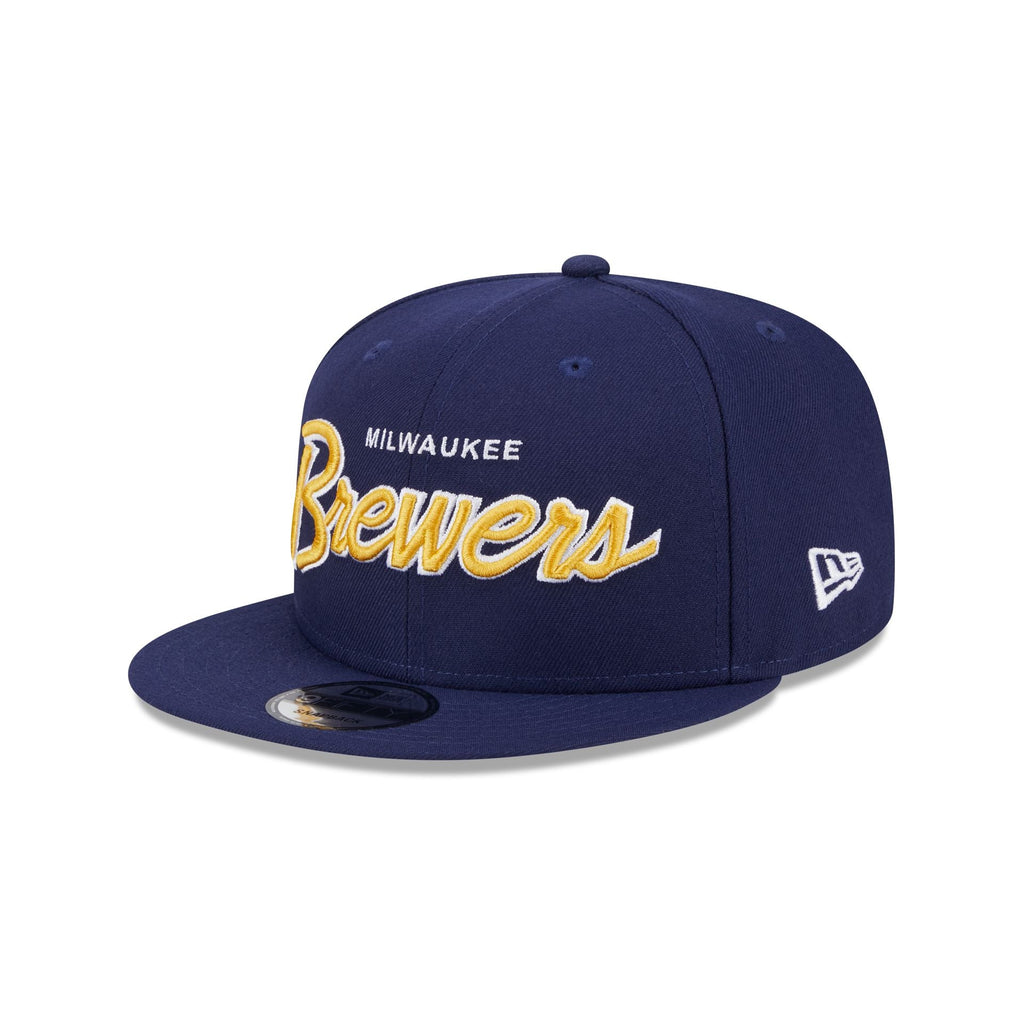 https://cdn.shopify.com/s/files/1/0601/2554/4675/files/60439969_9FIFTY_950EGSCRIPT_MILBRE_OTC_3QL.jpg?v=1713795155