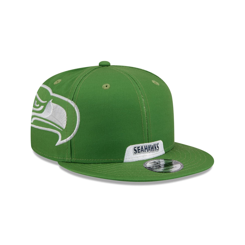 https://cdn.shopify.com/s/files/1/0601/2554/4675/files/60764024_9FIFTY_NFL25RVLHMTSEASEA_SEASEA_OTC_3QR.jpg?v=1762982857