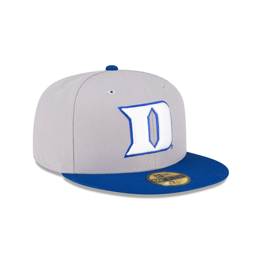 https://cdn.shopify.com/s/files/1/0601/2554/4675/files/70788315_59FIFTY_STOCK_DUKBLU_GRA_3QR.jpg?v=1695676649